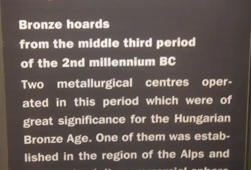 Bronze solar disc with cross in the center